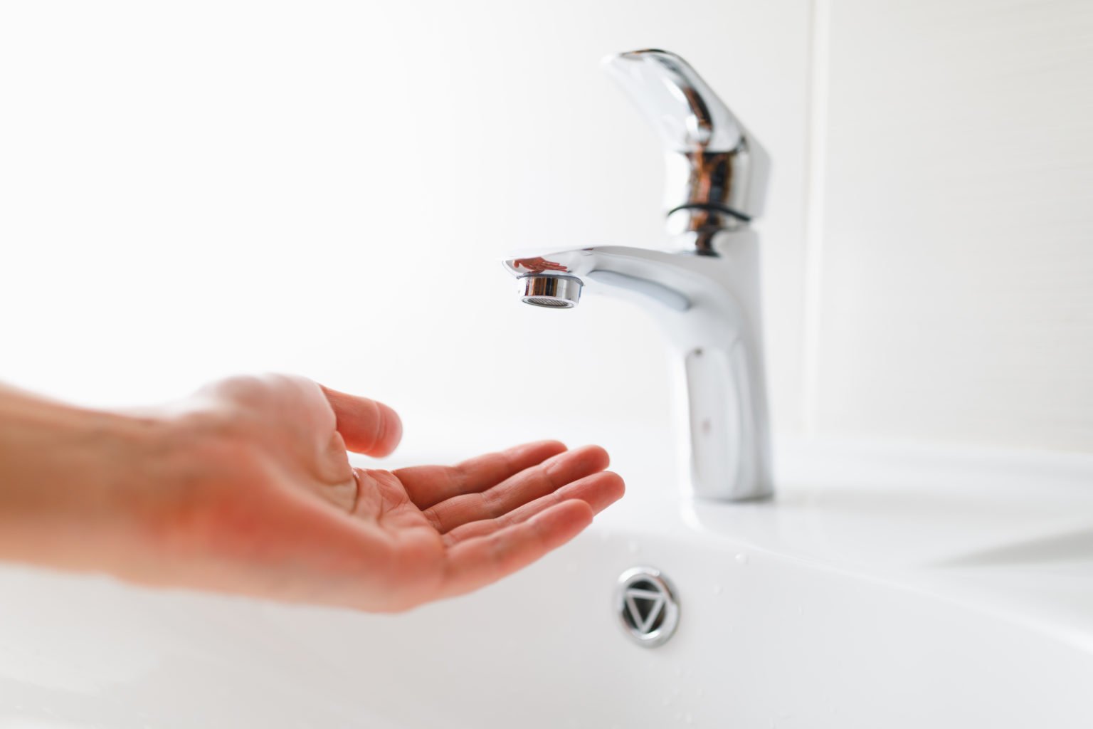 hand under faucet without water hand under faucet without water