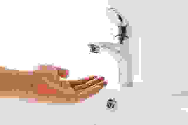 hand under faucet without water hand under faucet without water